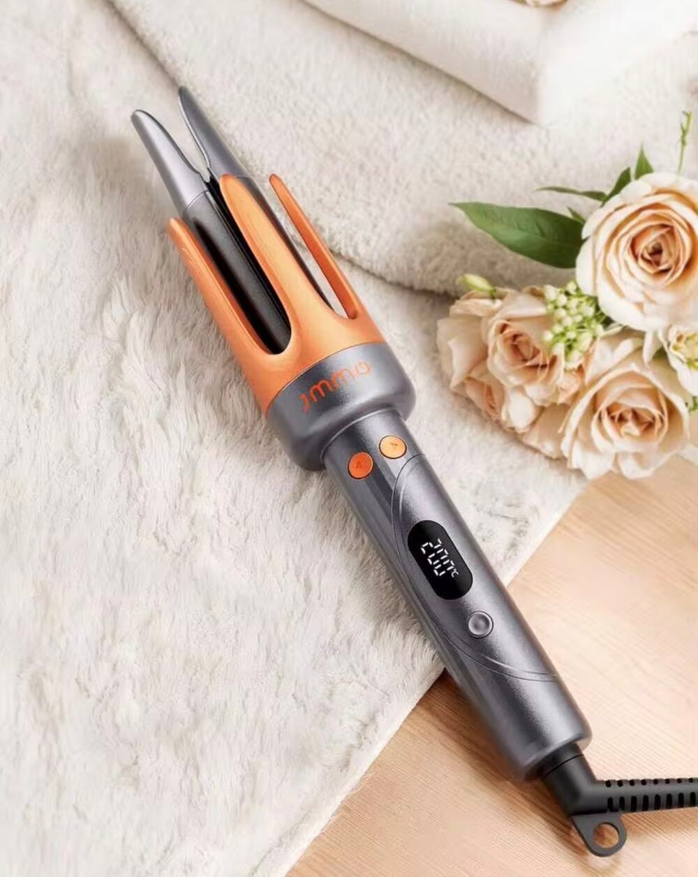 Automatic curling iron new in box NWT.